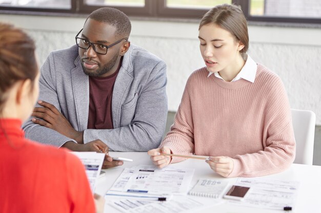 Group of employees working in office