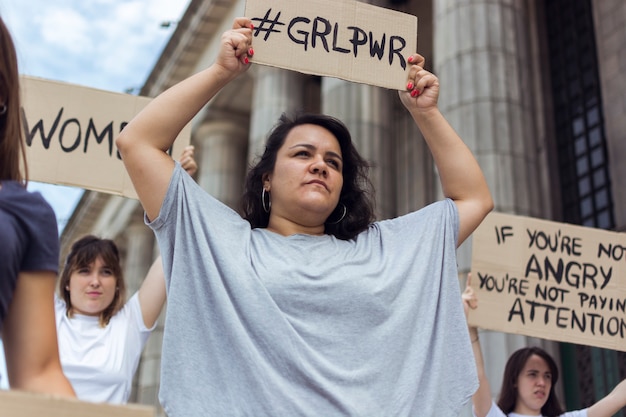 Group of female protesters demonstrating together