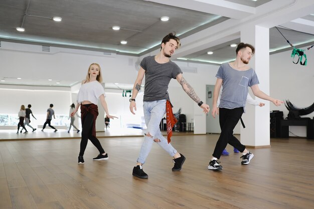 Premium Photo | Group of four hip-hop dancers
