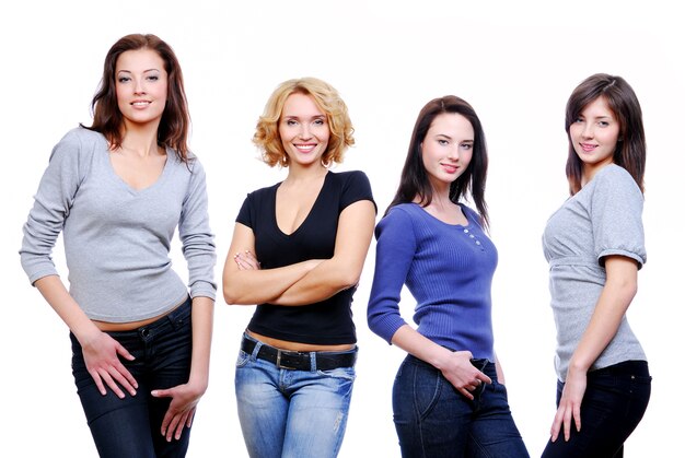 Group of four young happy girls.