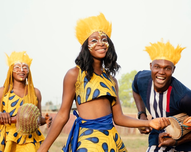 Group of friends enjoying carnival – Free Stock Photo