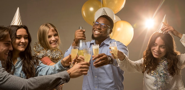 Group of friends celebrating new year concept