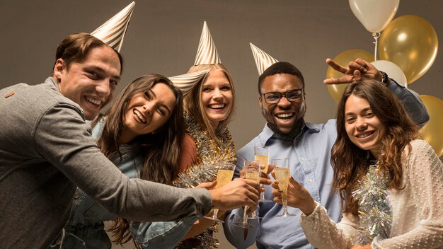 Group of friends celebrating new year concept