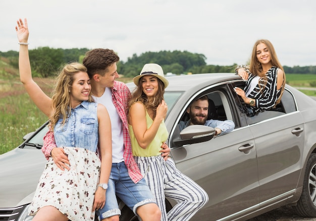 Group of friends enjoying on road trip