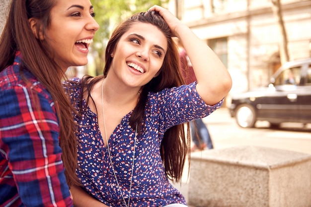 Group of friends enjoying in the street