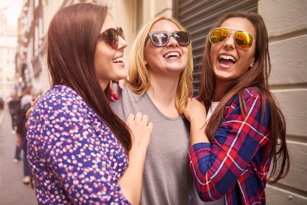 Group of friends enjoying in the street