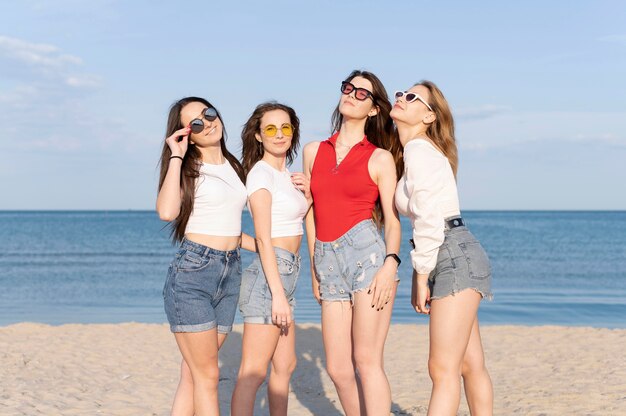 Group of friends having fun at beach