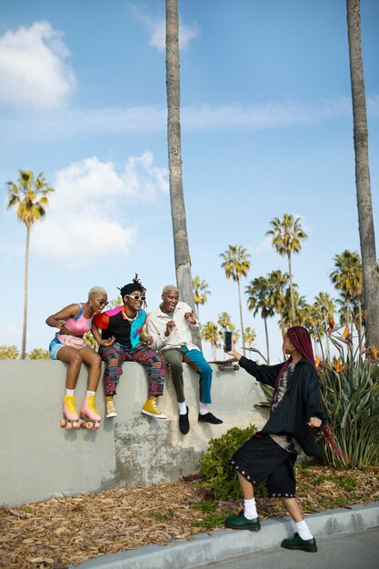 Group of friends having fun outside in the park