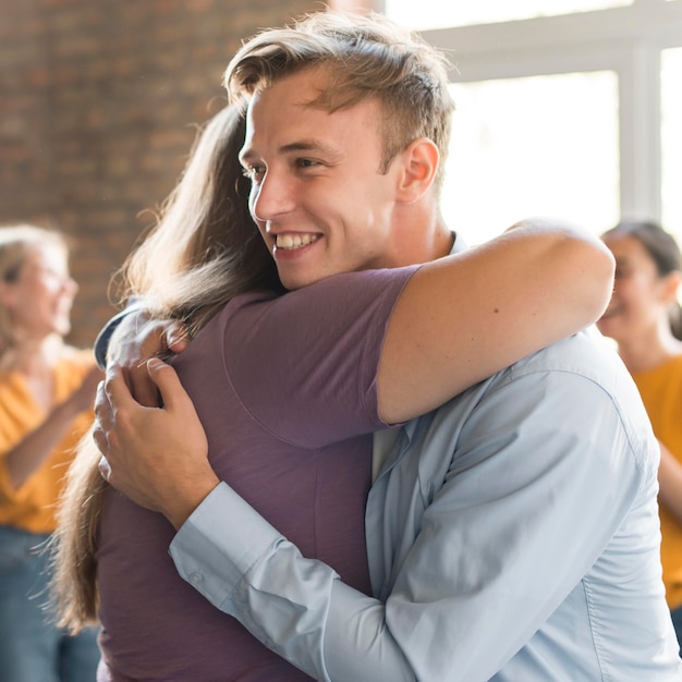 Group of friends hugging each other