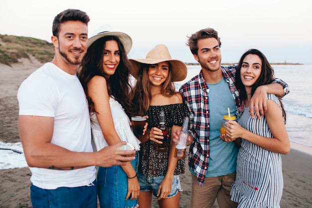 Group of friends meeting at the beach