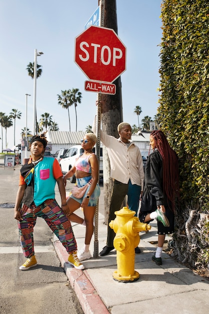 Group of friends posing outside in the city