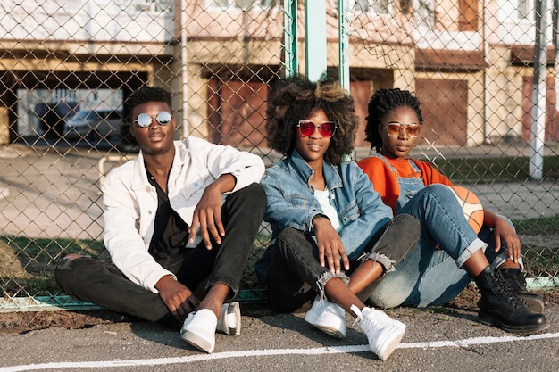 Free Photo group of friends posing together outdoors