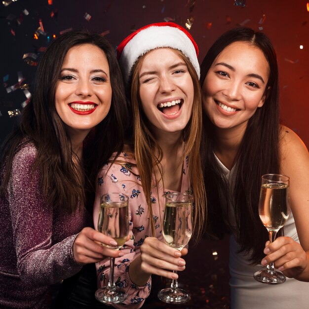 Group of friends toasting with champagne