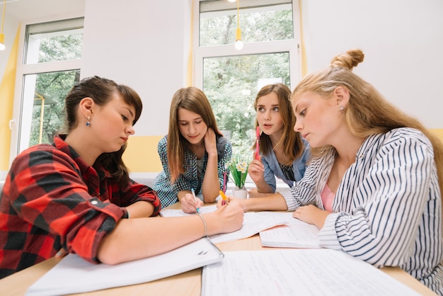 Group of girls studying in library