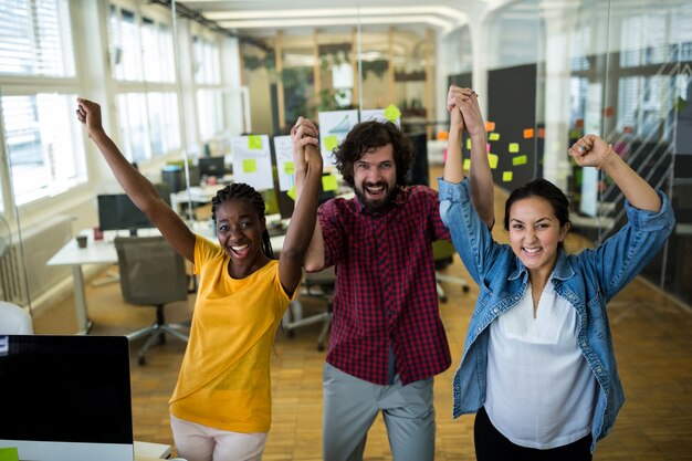 Group of graphic designers cheering together