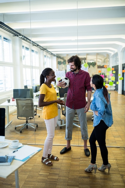 Free photo group of graphic designers interacting with each other