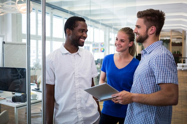 Group of graphic designers interacting with each other