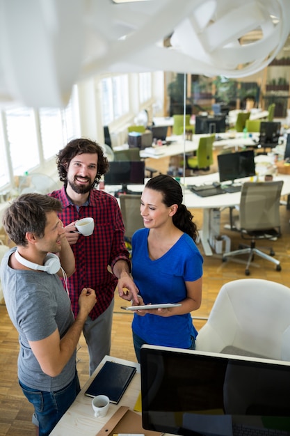 Group of graphics designers using digital tablet