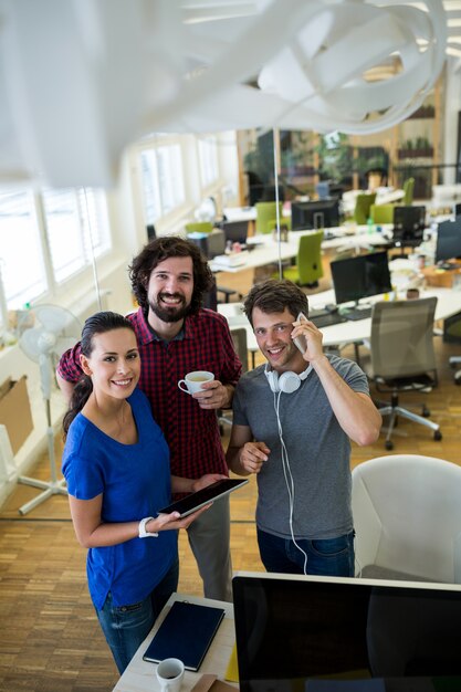 Group of graphics designers using digital tablet