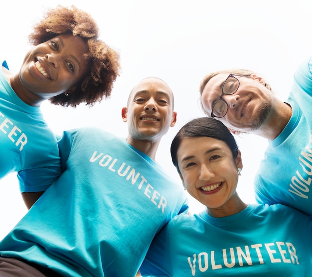 Group of happy and diverse volunteers