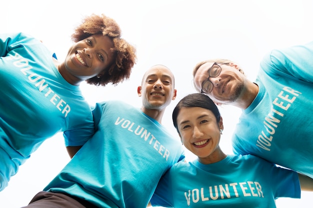 Group of happy and diverse volunteers