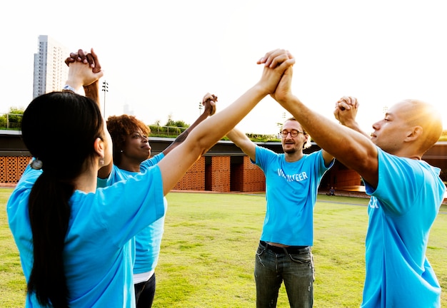 Group of happy and diverse volunteers