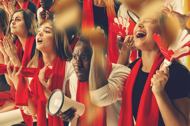 Group of happy fans are cheering for their team victory. Collage made of six models.