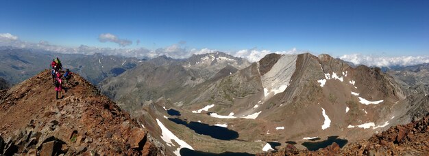 Group of hikers on the top of the mountain