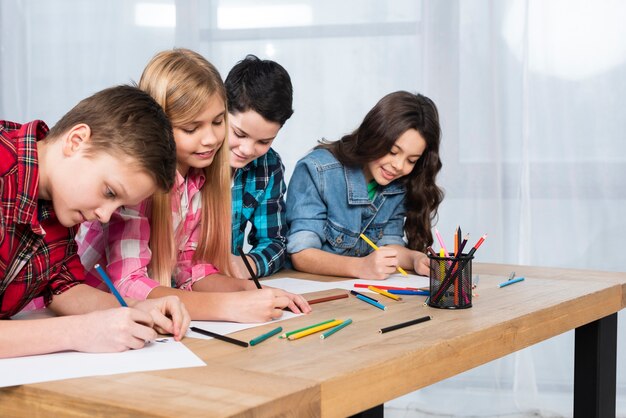 Group of kids coloring