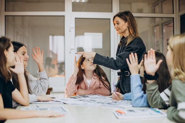 Free photo group of kids studying at school