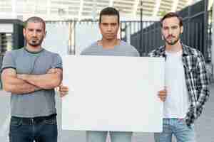 Free photo group of men demonstrating together