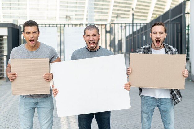 Group of men protesting together for peace