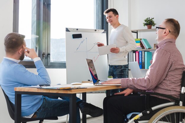 Group of men working together at the office