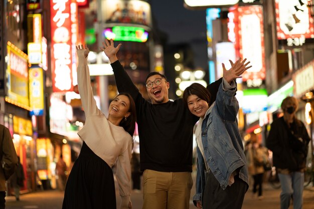 Group of middle age friends having fun at night