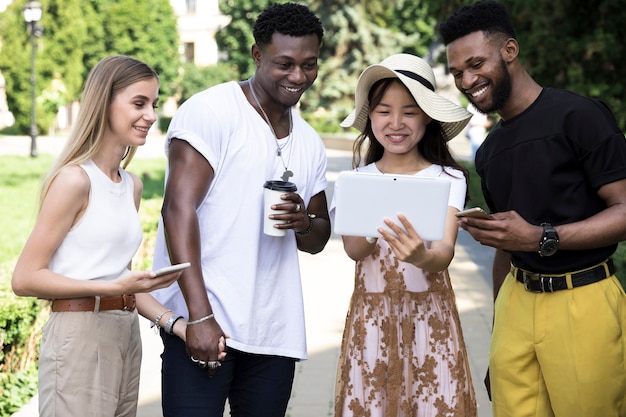 Free photo group of multicultural friends having fun