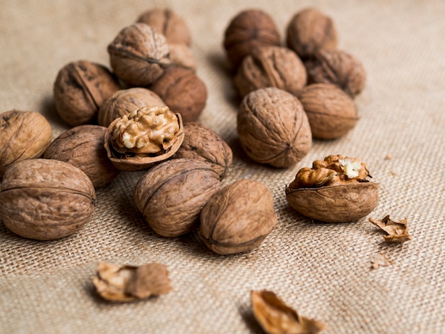 Group of nuts on brown background