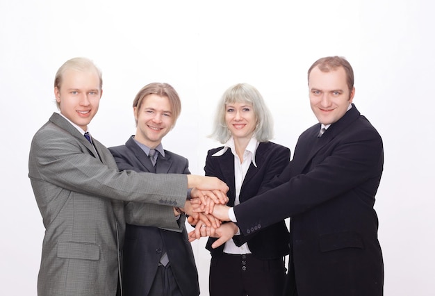 Группа деловых людей со сложенными вместе руками Premium Фотографии