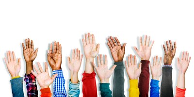 group of multiethnic diverse hands raised