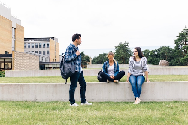 Group of people chatting in courtyard