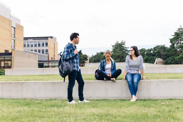 Group of people chatting in courtyard