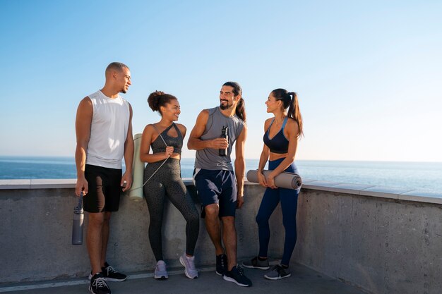 Group of people exercising together outdoors