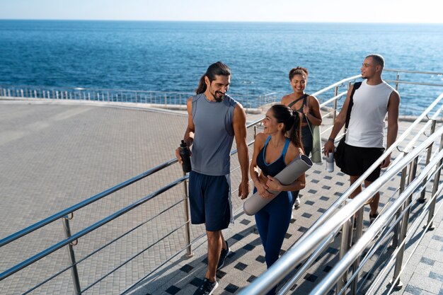 group of people exercising together outdoors
