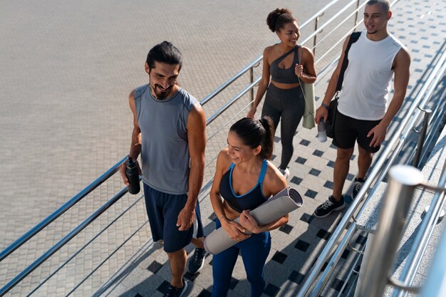 group of people exercising together outdoors