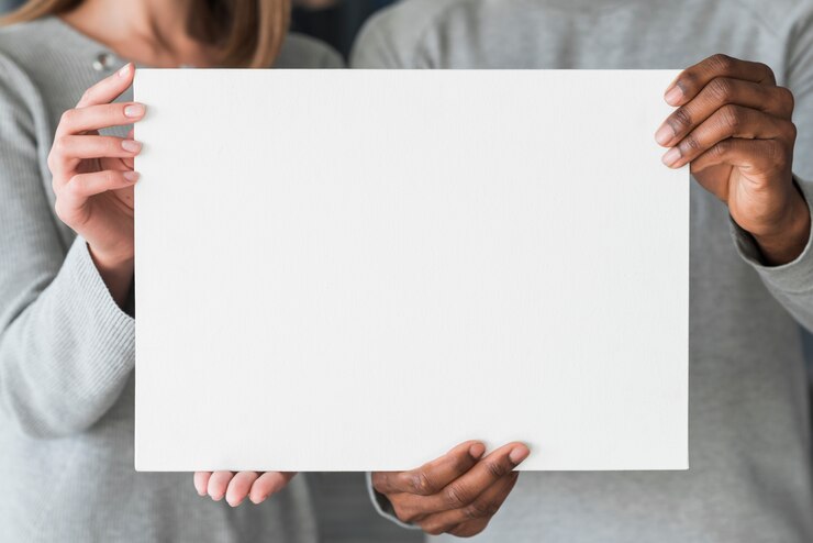 Free Photo group of people holding blank paper template