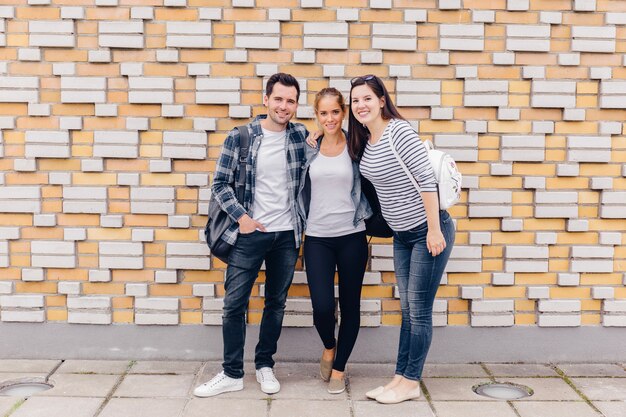 Group of people posing outside