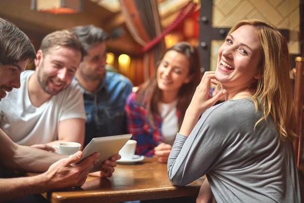 Group of people resting in the cafe