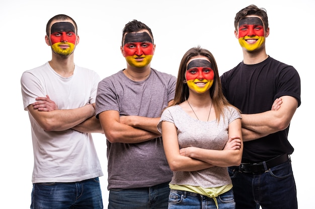 Group of people supporters fans of Germany national teams with painted flag face isolated on white. Fans emotions.