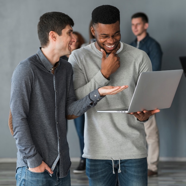 Free photo group of people with laptops