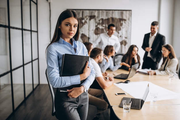 Group of people working out business plan in an office