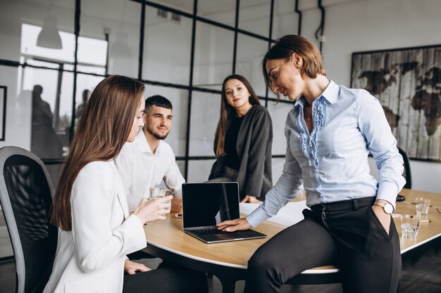 Group of people working out business plan in an office